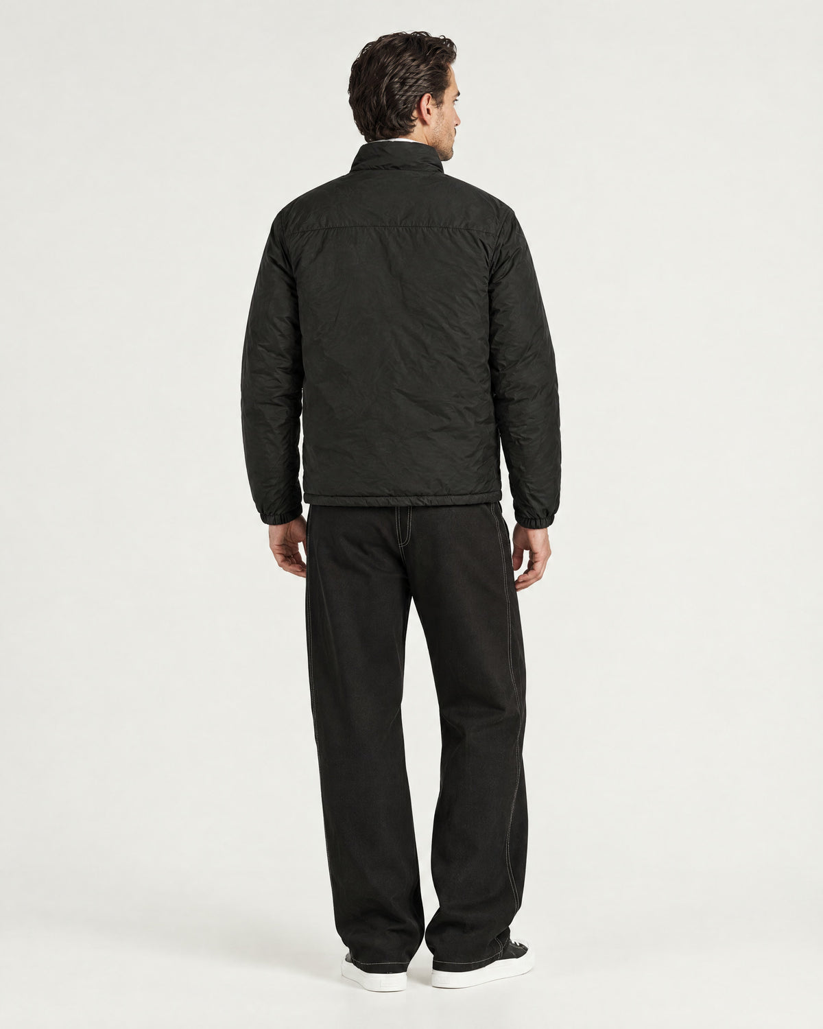 Romimi Reverso Jacket in Black, back view, worn