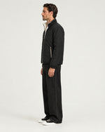 Romimi Reverso Jacket in Black, side view, worn