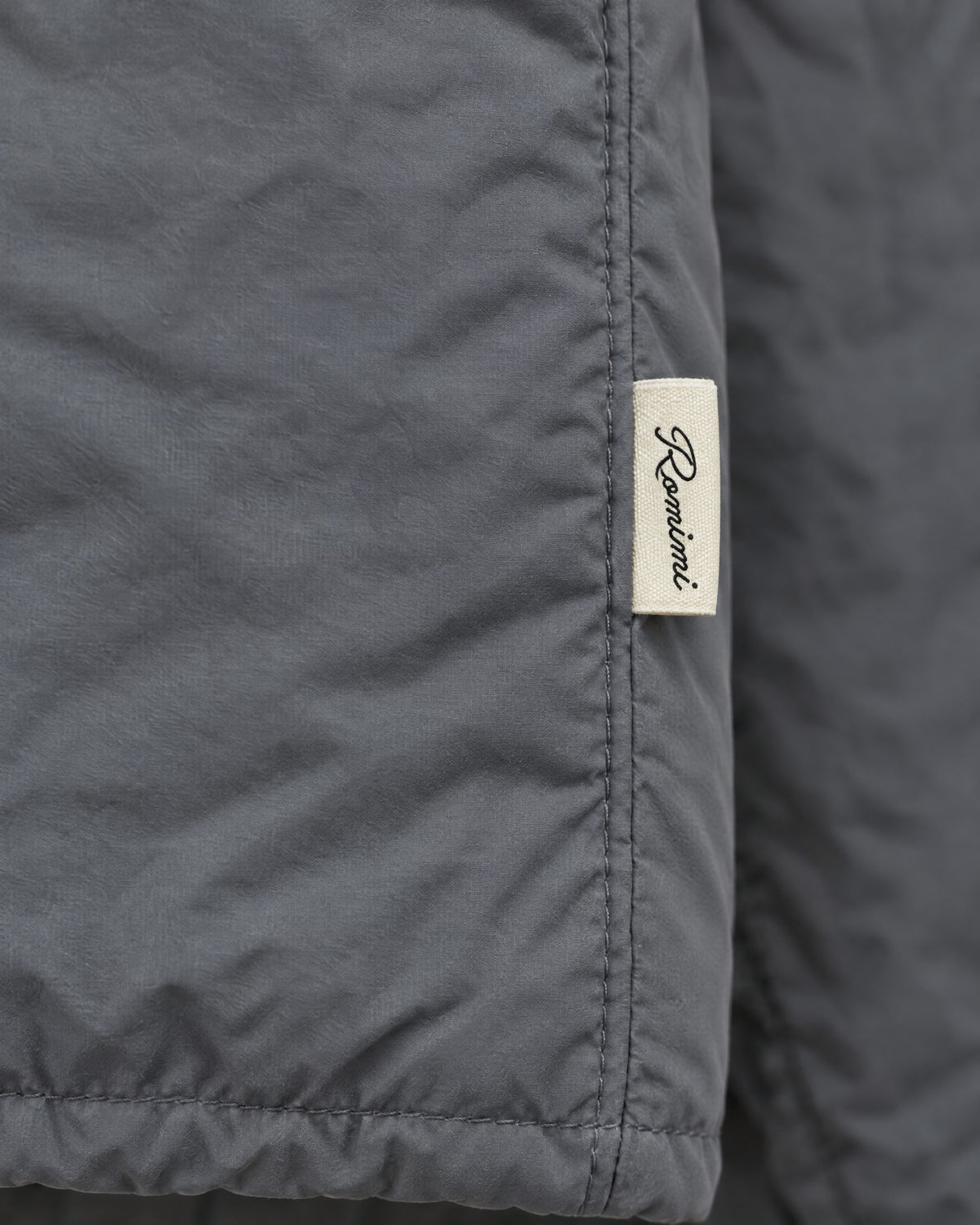 Romimi Reverso Jacket in Grey, label close-up