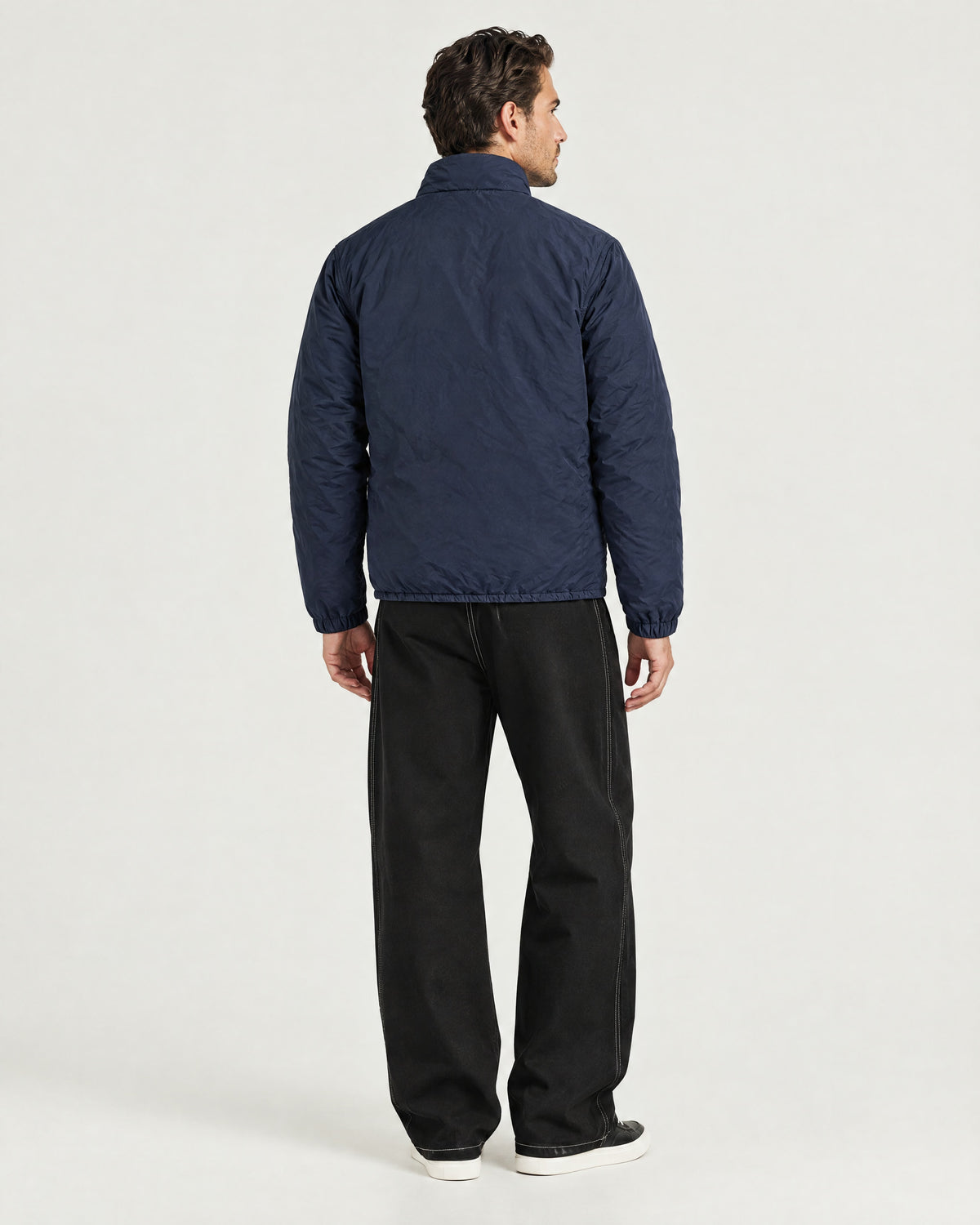 Romimi Reverso Jacket in Navy, back view, worn