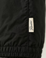 Romimi Reverso Set in Black / Cream, label close-up