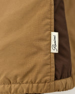 Romimi Reverso Set in Camel / Brown, label close-up