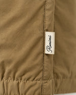 Romimi Reverso Set in Camel, label close-up