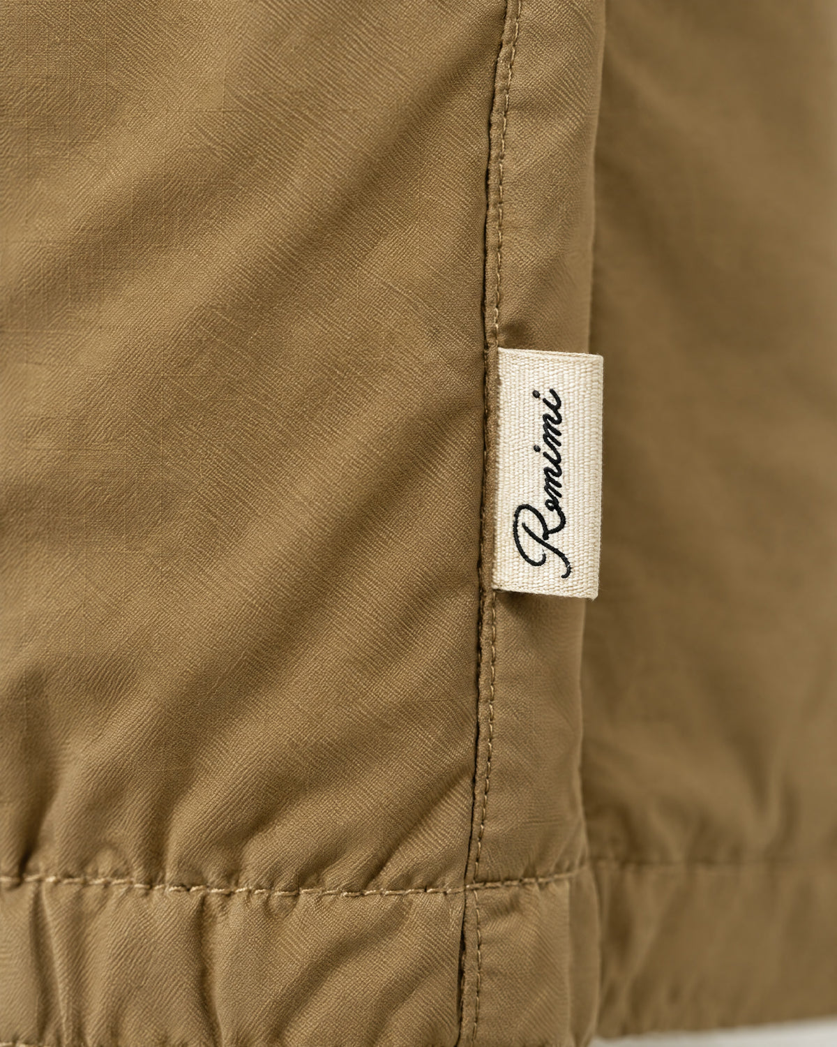 Romimi Reverso Set in Camel, label close-up