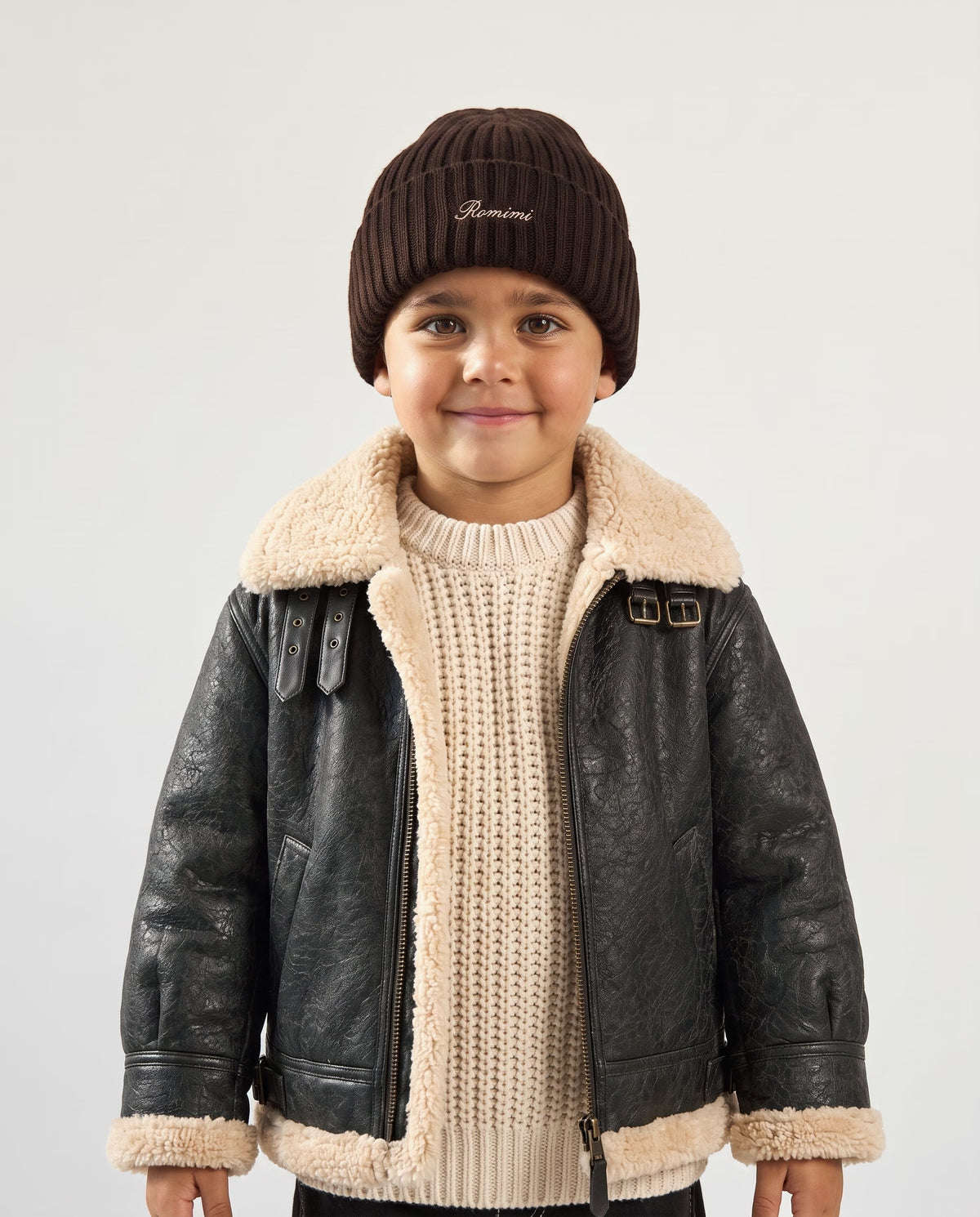 Little boy wearing the kids' rib-knit beanie in chocolate