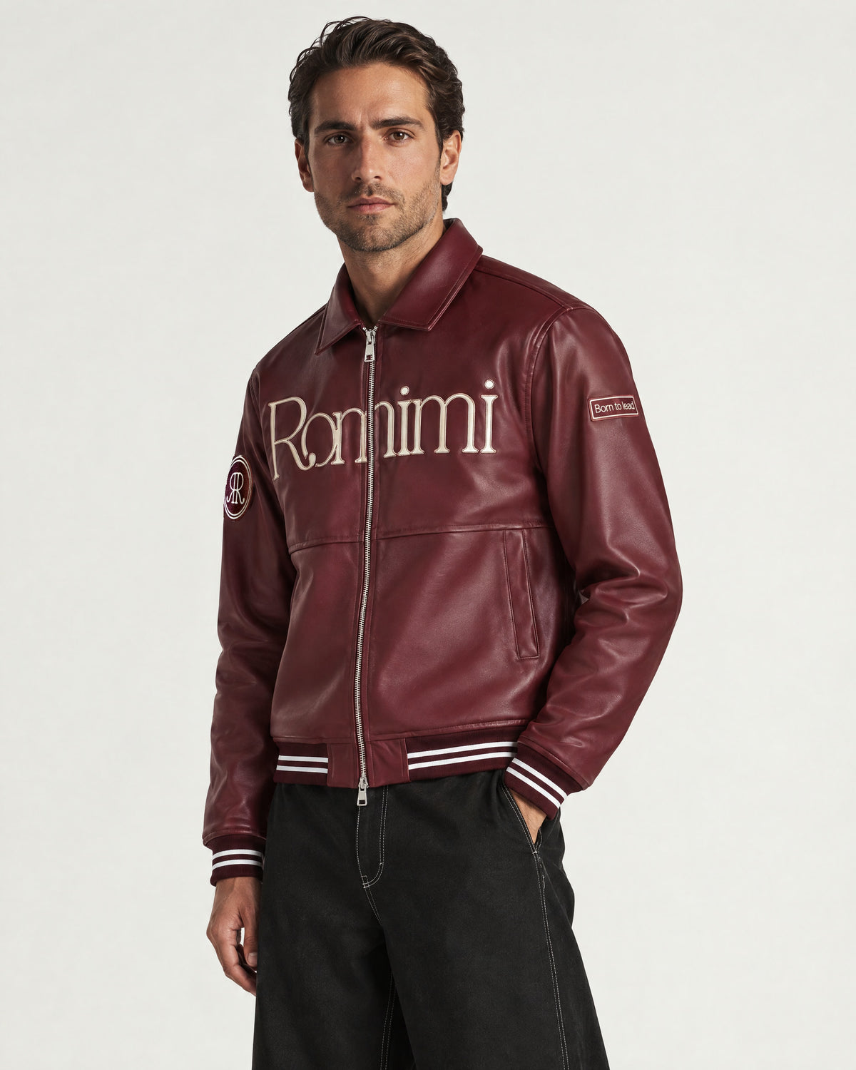 Man wearing the Romimi Signature Classic Bombers, three-quarter view