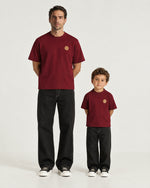 Father and son wearing the Romimi Signature Crest Tee