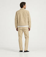 Romimi Slim Tech Suit in Beige, back view, worn