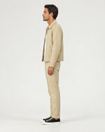 Romimi Slim Tech Suit in Beige, side view, worn