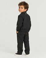 Romimi Slim Tech Suit for kids in Black, back view, worn