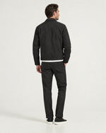 Romimi Slim Tech Suit in Black, back view, worn