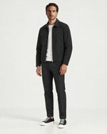 Romimi Slim Tech Suit in Black, worn