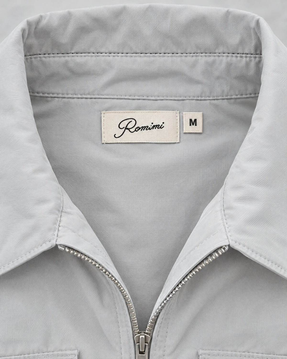Romimi Tech Cargo Set in Off-White, label close-up