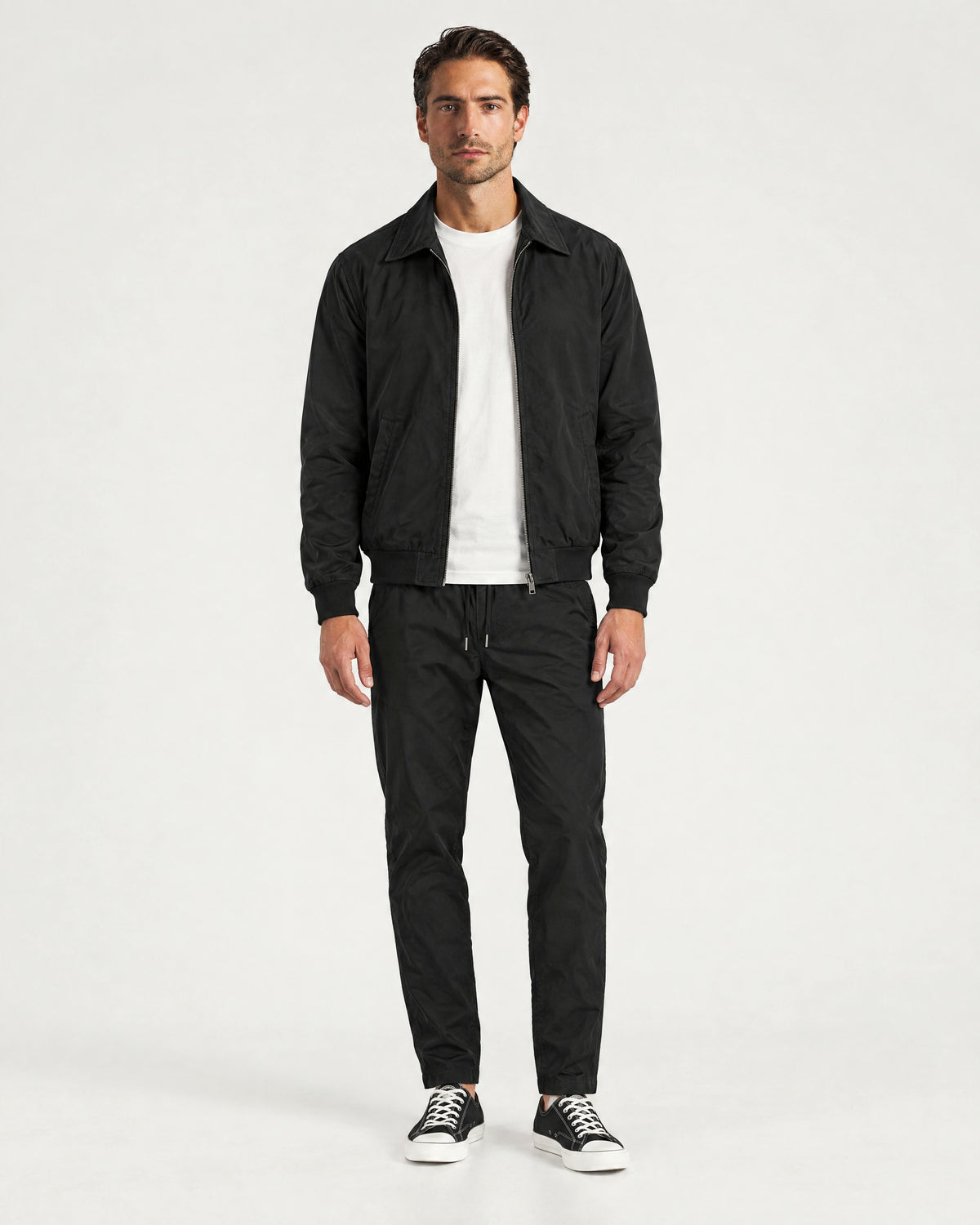 Romimi Tech Tracksuit in Black, worn