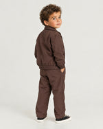 Romimi Tech Tracksuit for kids in Brown, back view, worn