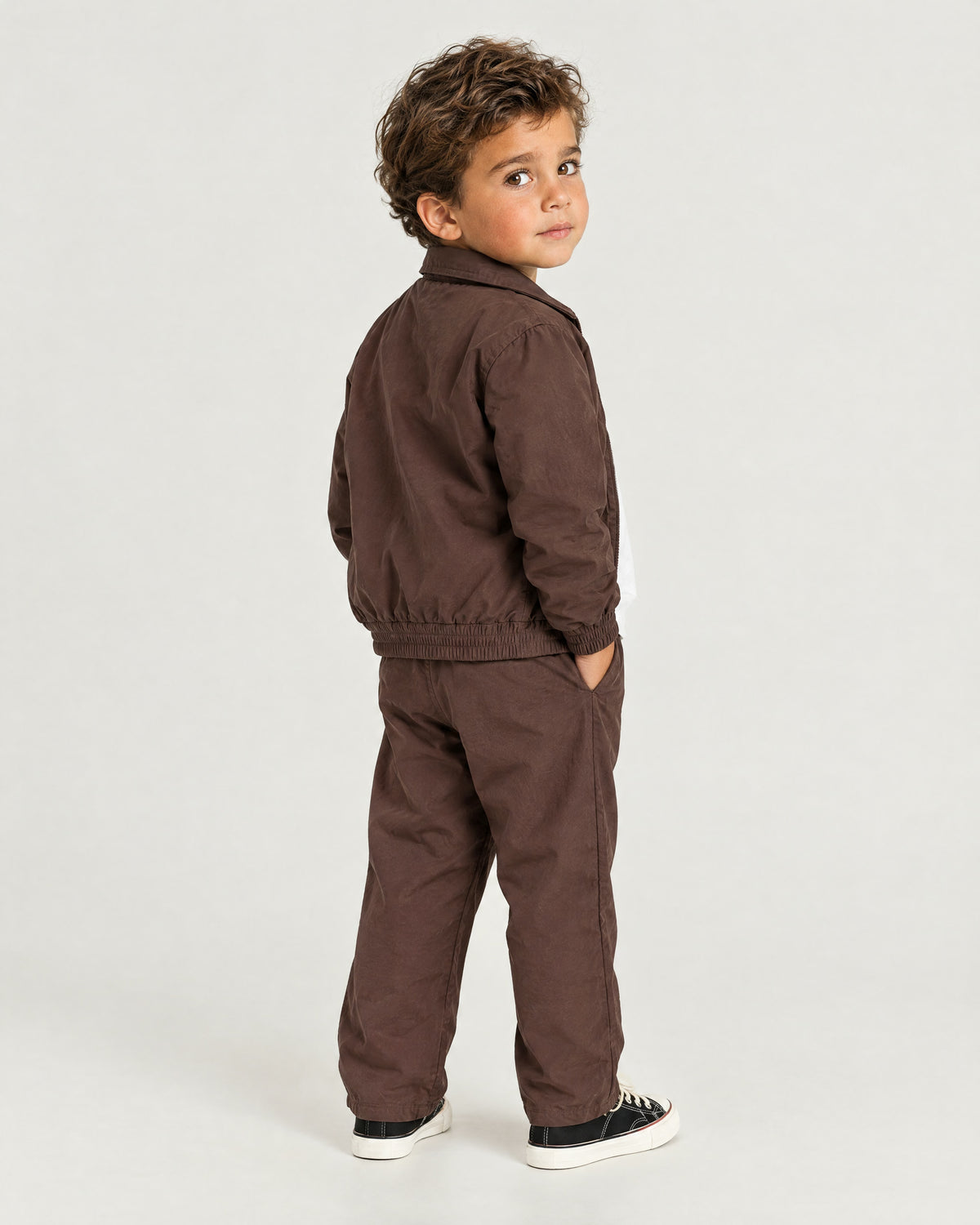 Romimi Tech Tracksuit for kids in Brown, back view, worn