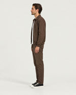 Romimi Tech Tracksuit in Brown, side view, worn