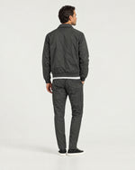 Romimi Tech Tracksuit in Charcoal, back view, worn