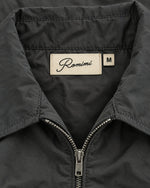 Romimi Tech Tracksuit in Charcoal, label close-up