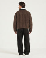 Man wearing the Romimi Trucker Jacket - Chocolat, back view