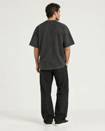 Romimi Washed Heavy Tee in Black, back view, worn