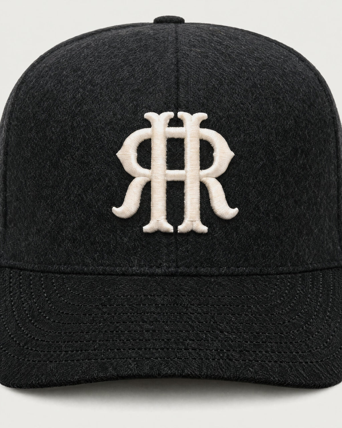 Romimi wool baseball cap in black, embroidery detail