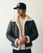 Man wearing the wool baseball cap in black