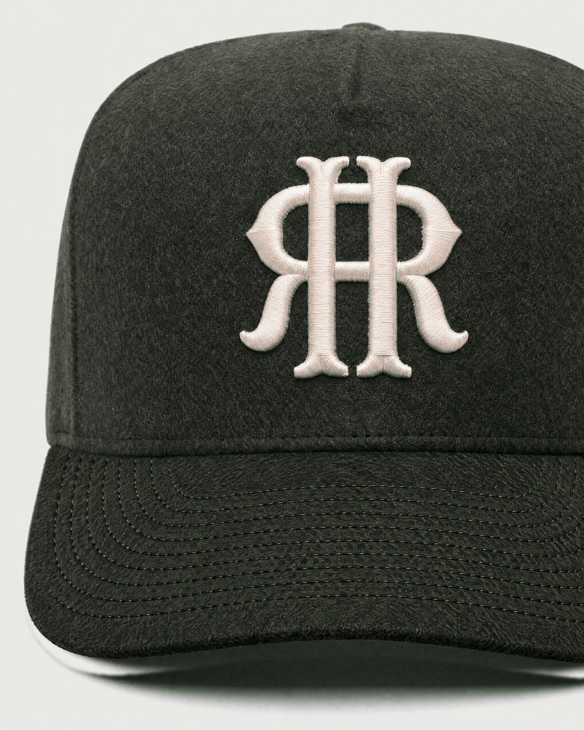 Romimi kids' wool baseball cap in dark olive, embroidery detail
