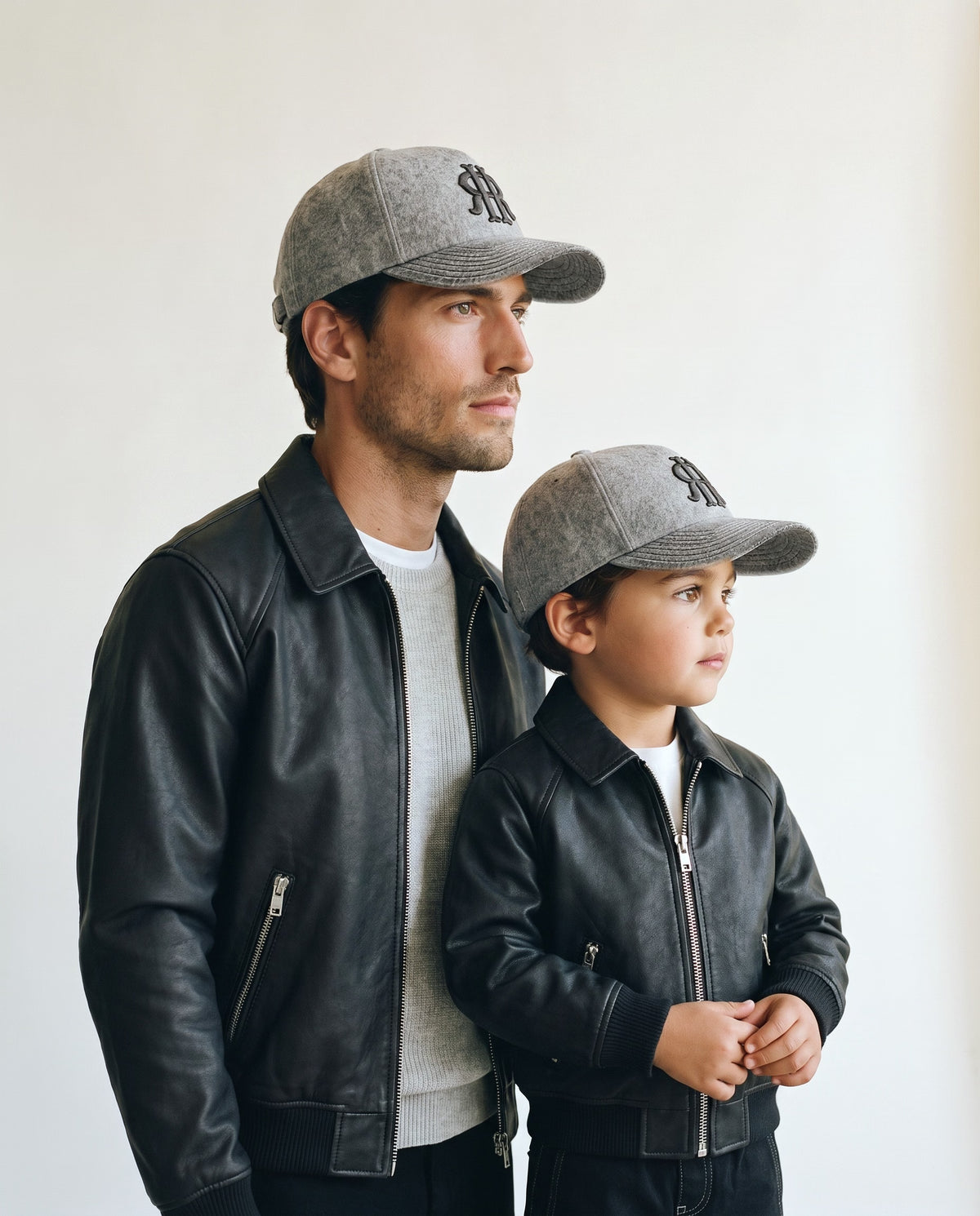 Father and son wearing the Romimi wool baseball cap in heather grey